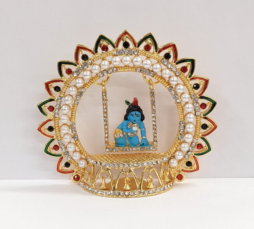 Image of baby Krishna - Laddu Gopal Idol on a Jhula - Swing.