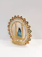 side view of a laddu gopal on a jhula