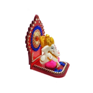 side view Image of Ganesha sitting on a throne - Pink dhoti