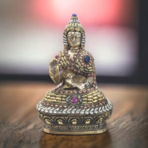 Brass buddha statue with hand crafted inlay work