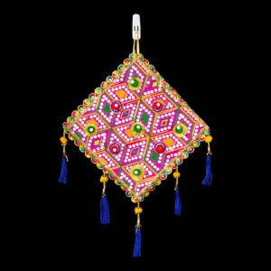 Image of a Pink handcrafted kite shaped wall hanging for home decor and Diwali decorations in Canada and the US.