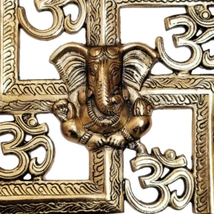 Image of a wall hanging of auspicious swastik with Ganesh and om brass hanging