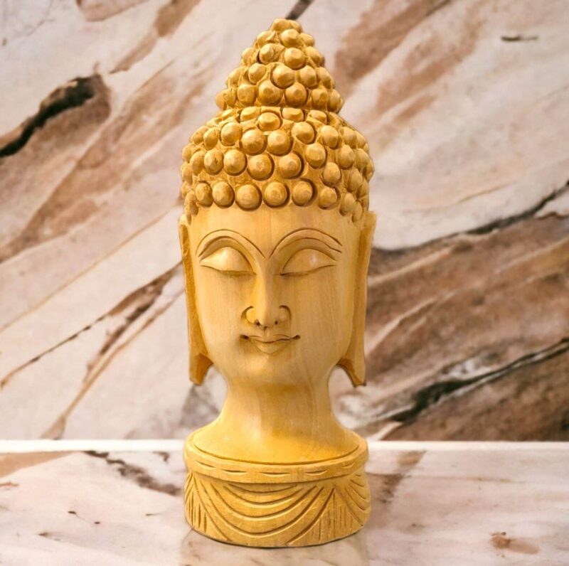 Image of a hand carved buddha face statue which is available in Canada and US