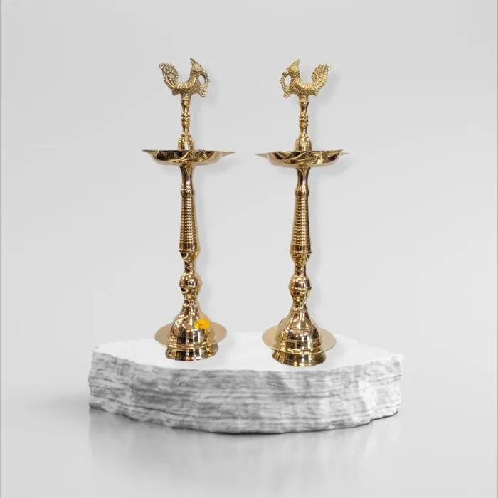 Pair of Kerala Murga Brass Lamps in Canada and the US.