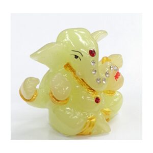 another side view Image of a glow in the dark Car dashboard Idol of Ganesha