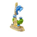 side view Image of Ganesha Car dashboard Idol holding a veena - blue