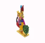 side view krishna car dashboard idol with peacock