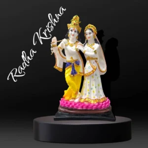 Large idol of Radha Krishna made out of marble dust poly stone with golden hues accent.