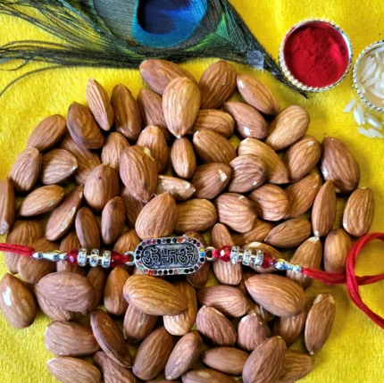 Om emblem rakhi with almonds hamper in Canada and the USA