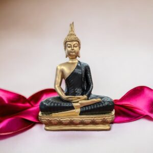 An elegant meditating Buddha statue with a black shawl for sale in Canada and the USA.