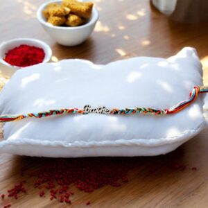 Send Rakhi to Canada: Colorful knotted band with Brother emblem