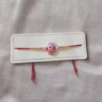 Send Rakhi online to Canada : Cute cartoon character Rakhi for Kids | Peppa Pig Rakhi