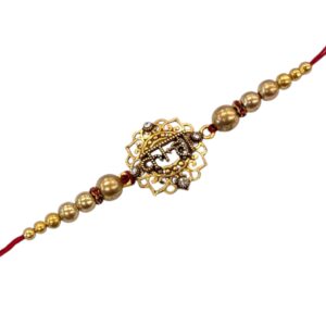 Close up of Elegant Gold Plated Kanha Rakhi