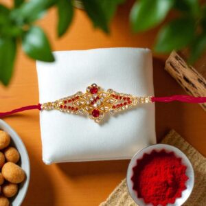 Dazzling Rakhi with gold plated cz stone