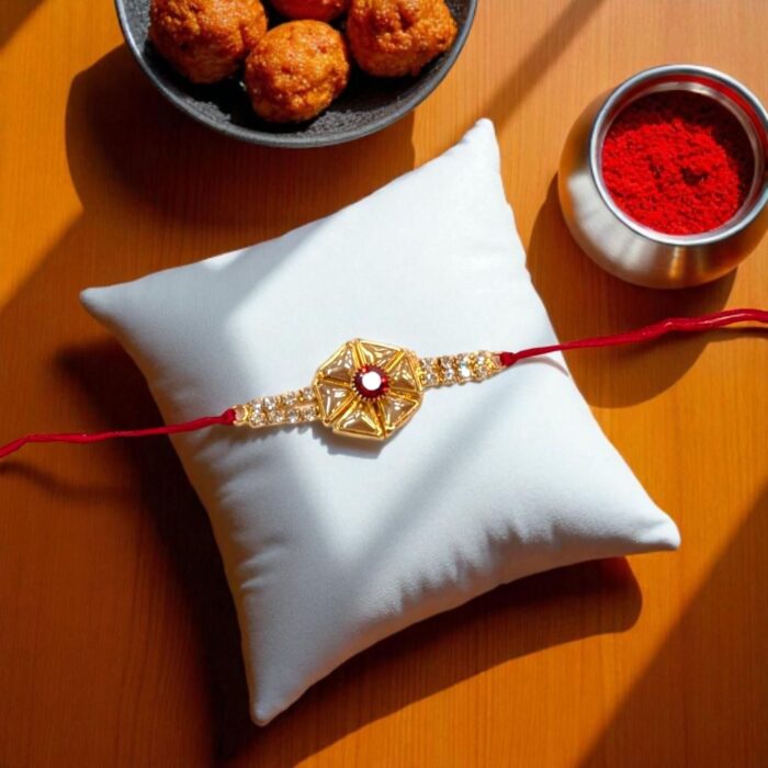 Send Rakhi to Canada quickly : Stylish Golden Rakhi