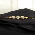 Close up of black bead bracelet with stone work | Mangalsutra Bracelet