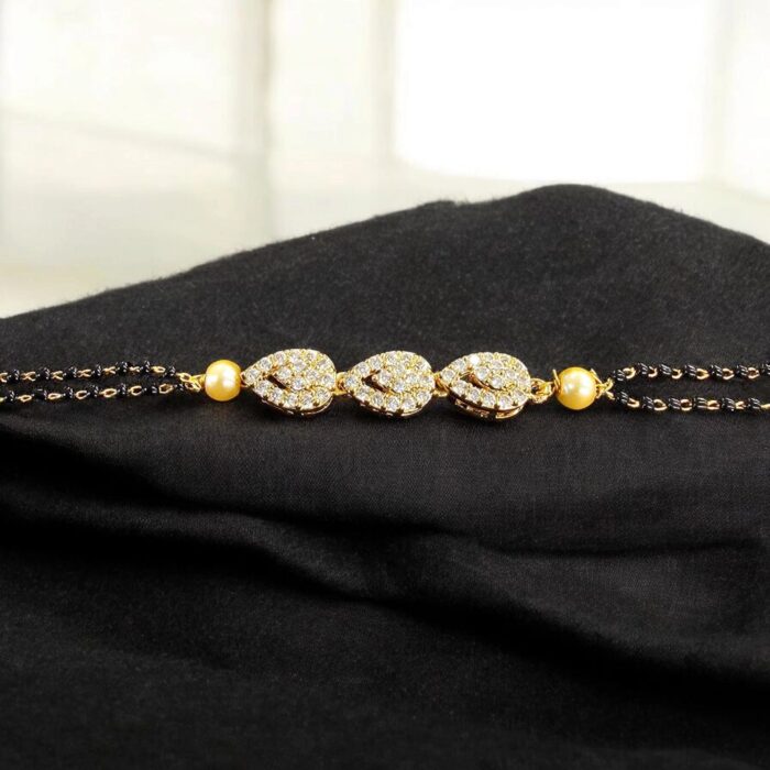 Close up of black bead bracelet with stone work | Mangalsutra Bracelet Close up of black bead bracelet with stone work | Mangalsutra Bracelet