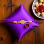 Send Rakhi to Canada at lowest Price : Om Gold Plated Rakhi