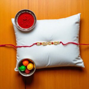 Gold Plated Rakhi with stones
