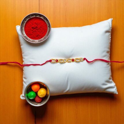 Gold Plated Rakhi with stones