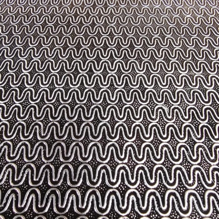 Close up of the metal inlay on the wooden tray