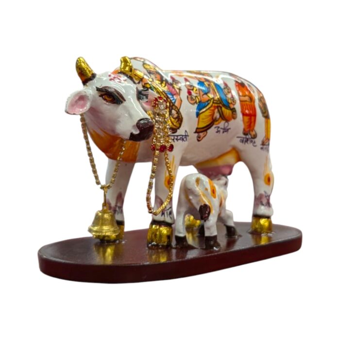 Side profile view of hand painted Kamdhenu Idol