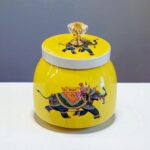 Stylish yet traditional container with Indian style pichwai art work