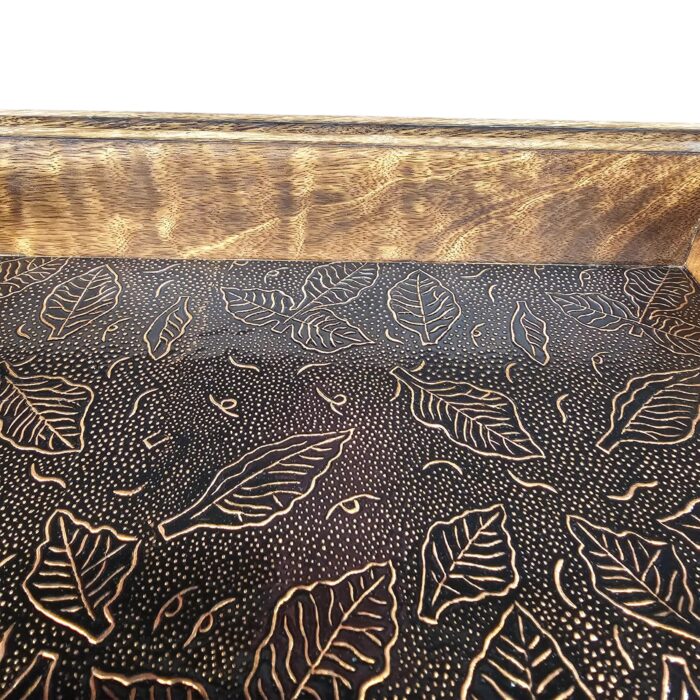 Close up of metal inlay on the mango wood serving trays