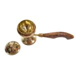Top profile view of the brass sambrani burner with wooden handle
