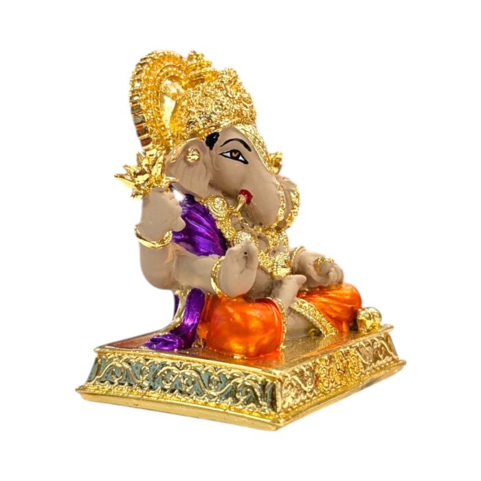 Side profile view of Gold plated Dagdusheth Ganesha Idol Side profile view of Gold plated Dagdusheth Ganesha Idol