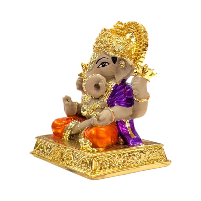 Side profile view of Gold plated Dagdusheth Ganesha Idol Side profile view of Gold plated Dagdusheth Ganesha Idol