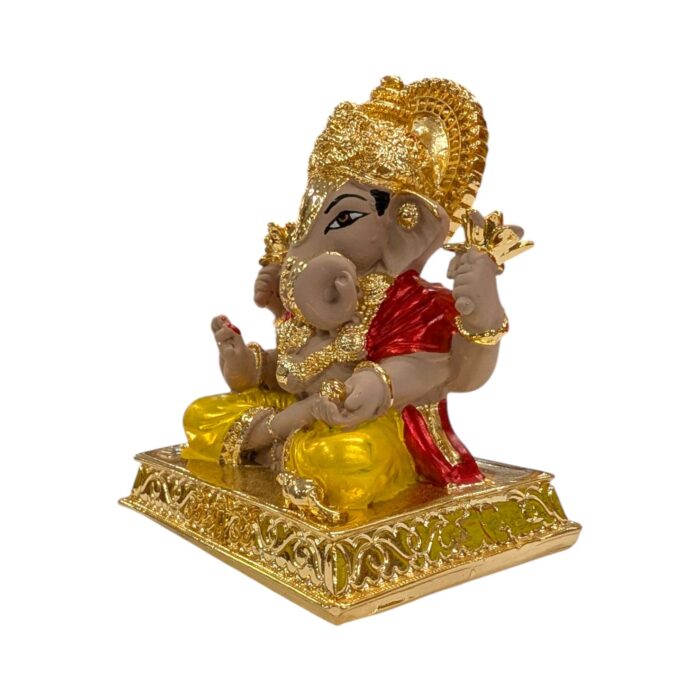Side profile view of Gold plated Dagdusheth Ganesha Idol Side profile view of Gold plated Dagdusheth Ganesha Idol