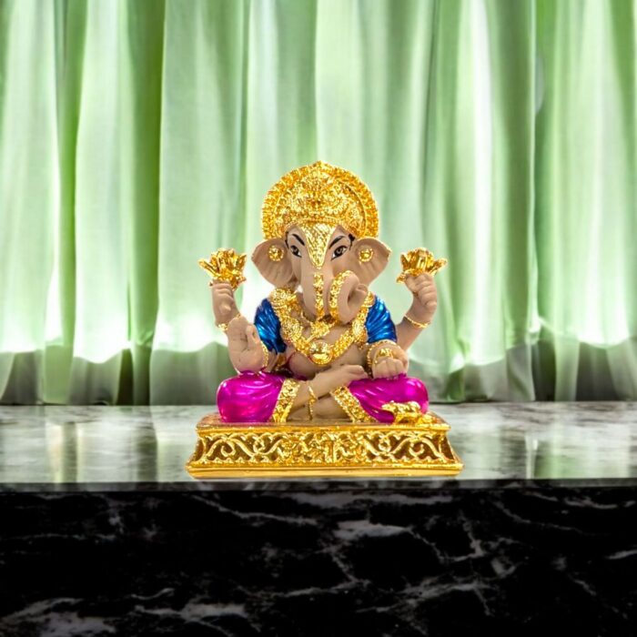 Dagdusheth Ganesha Idol - 3 Inches - Pink Dhoti Dagdusheth Ganesha Idol - 3 Inches - Pink Dhoti | Car dashboard Idol