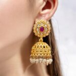 Model wearing semi precious earrings