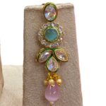 Close up of the earring with kundan and AD stone work