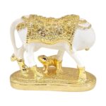 Backside profile view of gold plated Kamdhenu cow