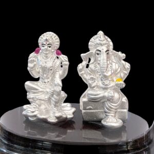 Pure silver Lakshmi Ganesha idol in dome
