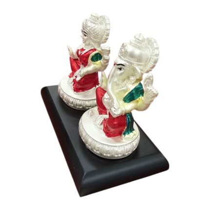 Side profile view of Lakshmi and Ganesha Idol