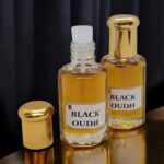 Close up of the smoky Black oudh Attar perfume oil bottles