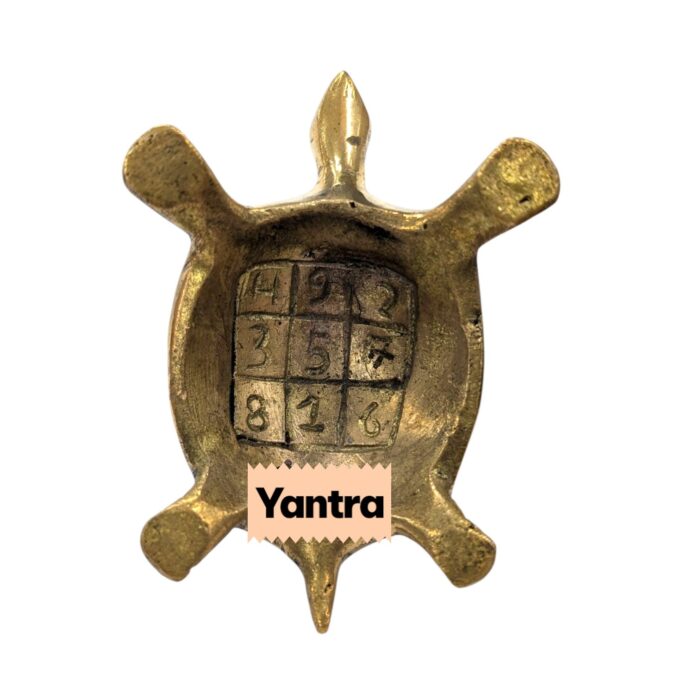 Yantra under brass tortoise