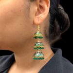 Model wearing 3 Tier Meena Jhumki earrings