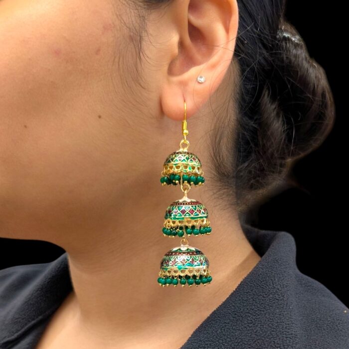 Model wearing 3 Tier Meena Jhumki earrings