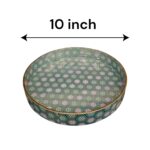 10-inch decorative serving tray with gold trim being used for coffee and pastries.