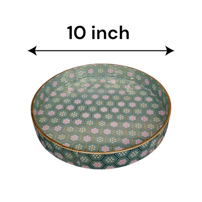 10-inch decorative serving tray with gold trim being used for coffee and pastries.