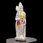 Side profile view of pure silver Murugan Idol