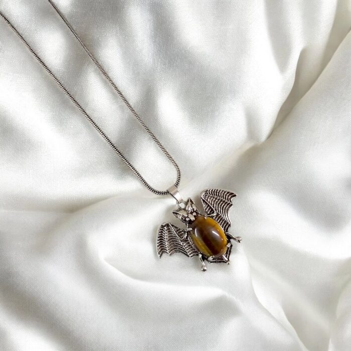 Handcrafted Bat pendant with natural Tiger Eye stone