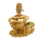 Side profile of Peacock themed kumkum box | Copper made gold plated sindoor container