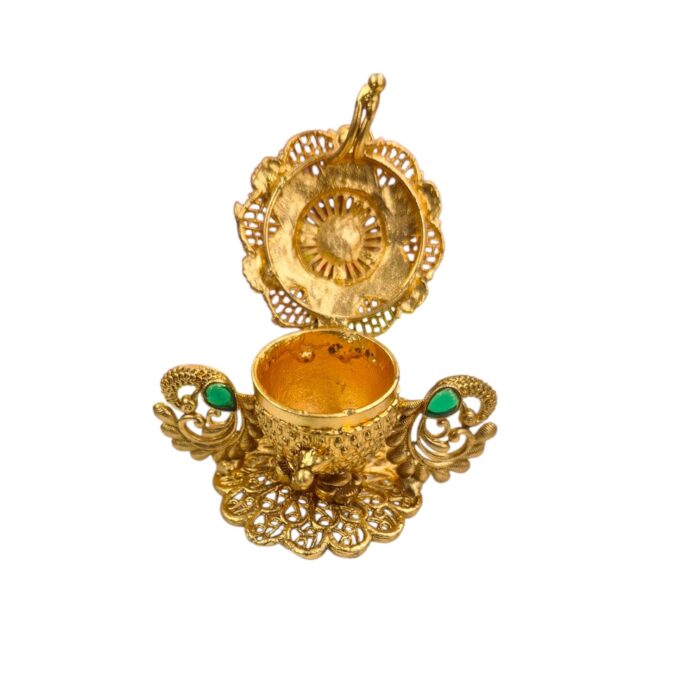 Lid open view for the peacock themed kumkum container