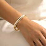 Elegant Gold-Tone Pearl & AD Stone Curved Bangle