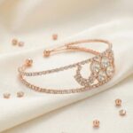 Side profile view of this elegant American Diamond rose finish bracelet kada